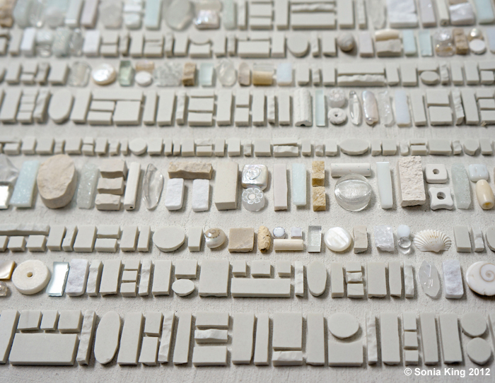 Coded Message: Note in Invisible Ink mosaic (detail) by Sonia King Mosaic Artist