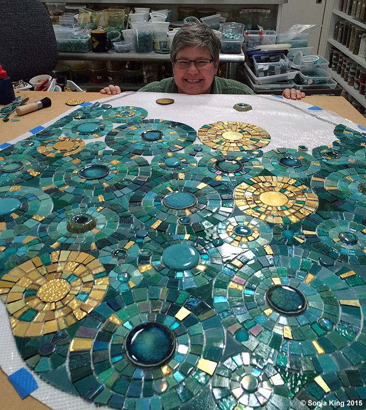 Trusty Assistant Leigh Davis with 'VisionShift', a new mosaic installation by Sonia King